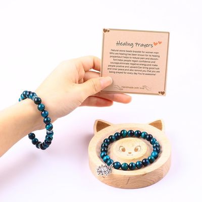 El brazalete de la mano de la piedra de la cara del tigre azul turquesa redonda elástica con cuentas