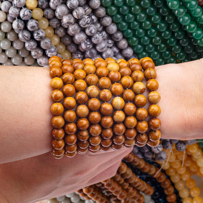 Perlas redondas de madera amarilla de grano de cristal natural piedra preciosa de madera de jaspe hebras sueltas de perlas para hacer joyas