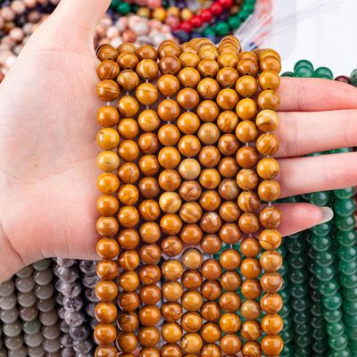 Perlas redondas de madera amarilla de grano de cristal natural piedra preciosa de madera de jaspe hebras sueltas de perlas para hacer joyas