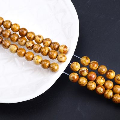 Perlas redondas de madera amarilla de grano de cristal natural piedra preciosa de madera de jaspe hebras sueltas de perlas para hacer joyas