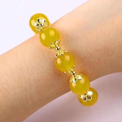 14MM Energía natural Calcedonia amarilla con tallado de corazón de jade amarillo Brazalete de cuentas de cristal de suerte
