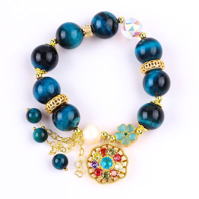 14MM Cristales de curación energética Ojo de tigre azul de flor giratorio Brazalete de perlas de encanto para el uso diario