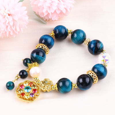 14MM Cristales de curación energética Ojo de tigre azul de flor giratorio Brazalete de perlas de encanto para el uso diario