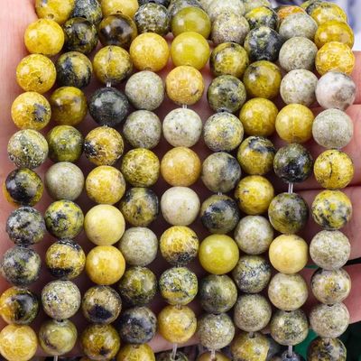 Piedra preciosa pulida 6 mm 8 mm Perlas de Howlite amarillo para la fabricación de artesanías