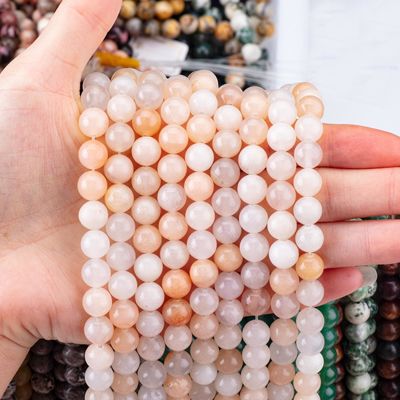 Perlas de gemas semipreciosas de 2 mm de color rosa aventurino de forma redonda