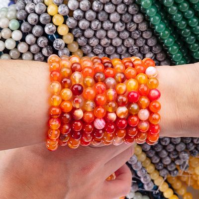 Piedra semipreciosa de agata a rayas naranja con hebras sueltas de perlas para la fabricación de joyas