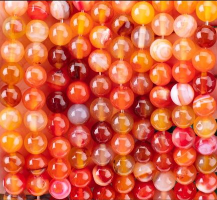 Piedra semipreciosa de agata a rayas naranja con hebras sueltas de perlas para la fabricación de joyas