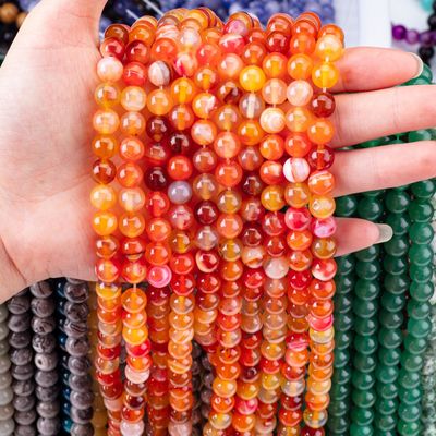 Piedra semipreciosa de agata a rayas naranja con hebras sueltas de perlas para la fabricación de joyas