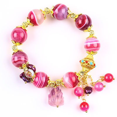 Brazalete de piedra de ágata rosa de 14 mm con talla de zorro púrpura de nueve colas