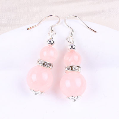 Orecillos hechos a mano de piedra cristalina de cuarzo rosa de piedra preciosa con cuentas de pendiente de orejas