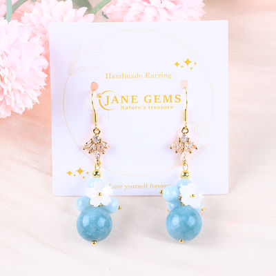 Custom DIY Cristal de aguamarina con el encanto de la flor blanca forma redonda de oreja de perlas para el uso diario