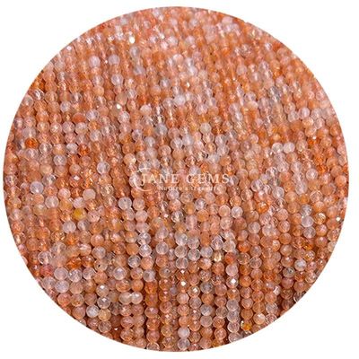 Perlas de gemas cristalinas naturales de forma redonda con facetas pequeñas de cítrico de piedra de sol de perlas sueltas