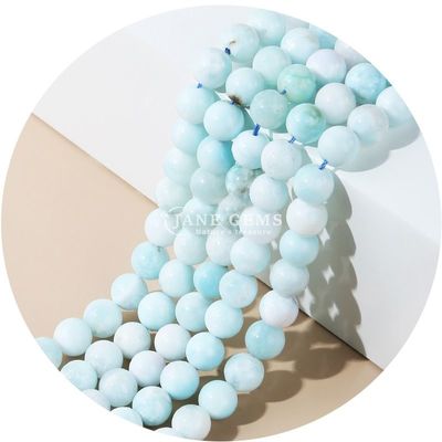 Venta al por mayor Natural 2A Flor de ciruela Turmalina Redonda Perlas sueltas Piedra de luna Florita Piedra de sol Perlas espaciadoras para joyas