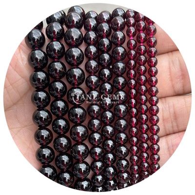 Venta al por mayor Natural 2A Flor de ciruela Turmalina Redonda Perlas sueltas Piedra de luna Florita Piedra de sol Perlas espaciadoras para joyas