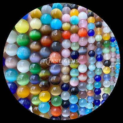 Forma redonda Perlas de gemas coloridas Azul Verde Naranja Color de gato Ojo de perlas sueltas Filamentos para pulseras