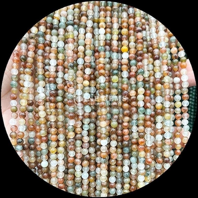 Técnica piedra preciosa pulida de forma redonda jardín cuarzo hilos de cuentas sueltas para diseños de joyas exquisitas